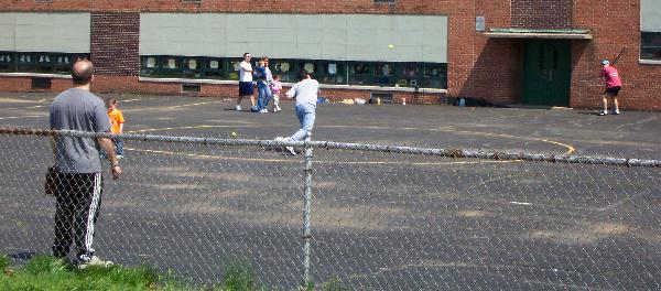 Anthony pitches to Ian, while Rich watches with rapt attention.